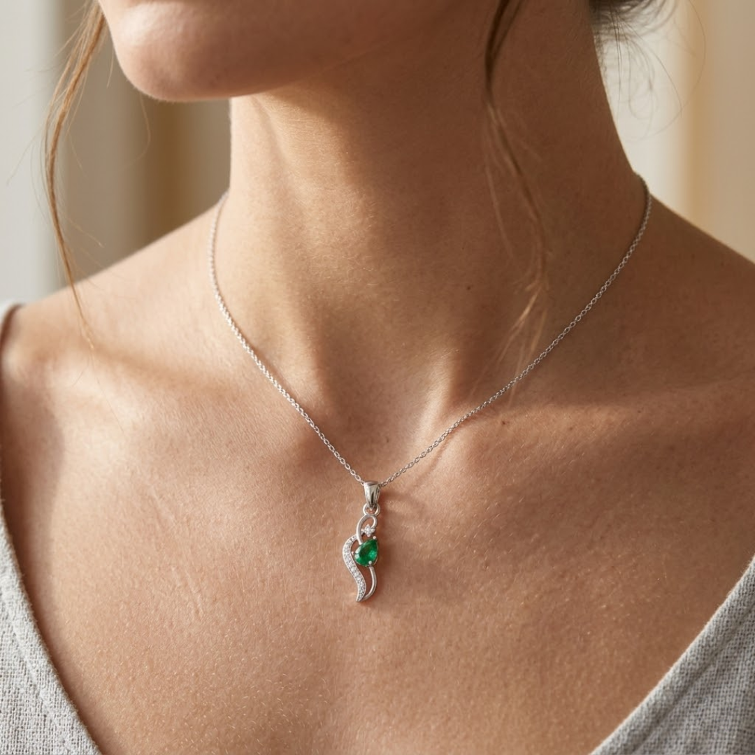 Colombian Emerald Pear Pendant with Diamond Wave Accent